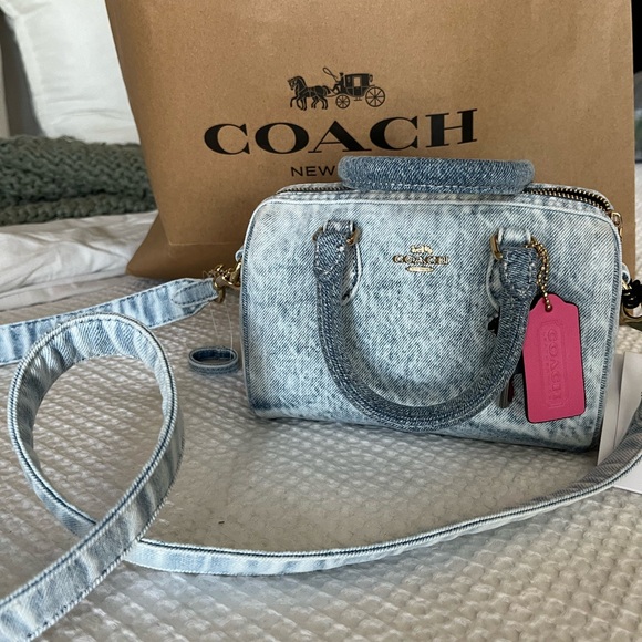 Coach Handbags - Coach Light Blue Denim MINI Satchel with Pink Tag